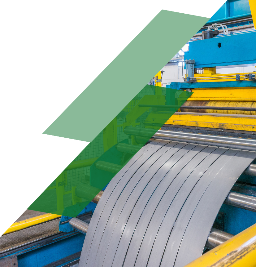 Steel slitting line processing a steel coil through automated rollers in an industrial production facility.