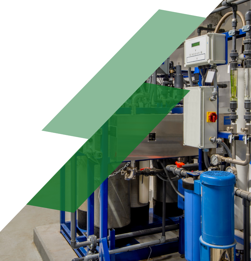 Water treatment process equipment with pumps, piping, instrumentation, and automation controls in an industrial treatment facility.